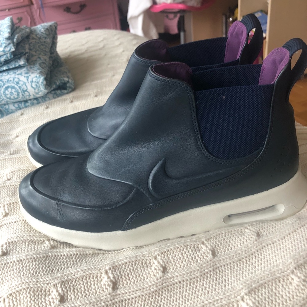 Lightly worn Navy Nike high top sneakers